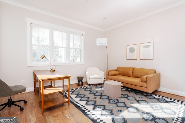 living room featuring hardwood / wood-style flooring and ornamental molding