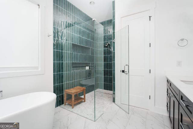 bathroom featuring shower with separate bathtub and vanity