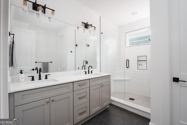 bathroom featuring tile patterned flooring, vanity, a shower with door, and crown molding