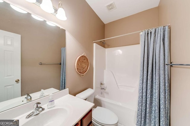 full bathroom featuring shower / bath combination with curtain, vanity, and toilet