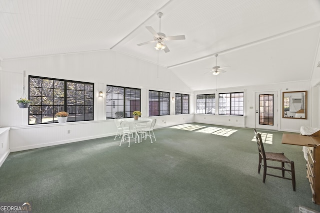 unfurnished sunroom featuring ceiling fan and lofted ceiling