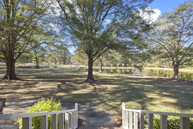 view of yard with a water view