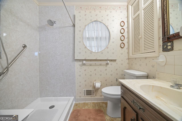 bathroom featuring tile patterned floors, ornamental molding, vanity, a shower, and toilet