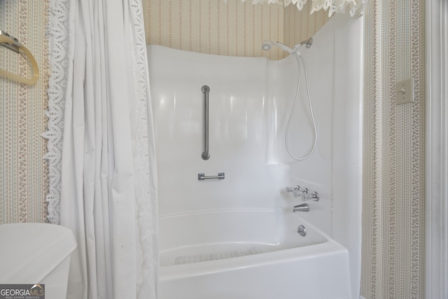 bathroom with shower / bath combination with curtain