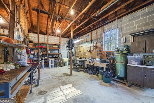 interior space featuring a workshop area