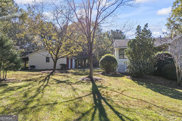 view of yard with a garage