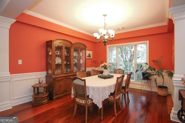 dining area featuring dark hardwood / wood-style floors and ornamental molding