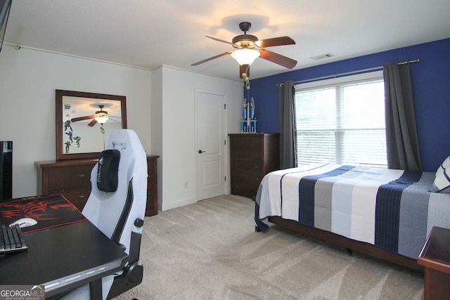 carpeted bedroom featuring ceiling fan