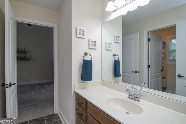 bathroom featuring tile patterned floors and vanity