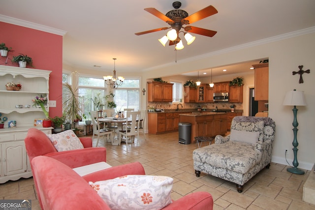 living room with crown molding, sink, and ceiling fan with notable chandelier