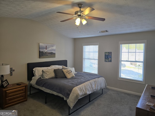 bedroom featuring carpet flooring, ceiling fan, a textured ceiling, and lofted ceiling