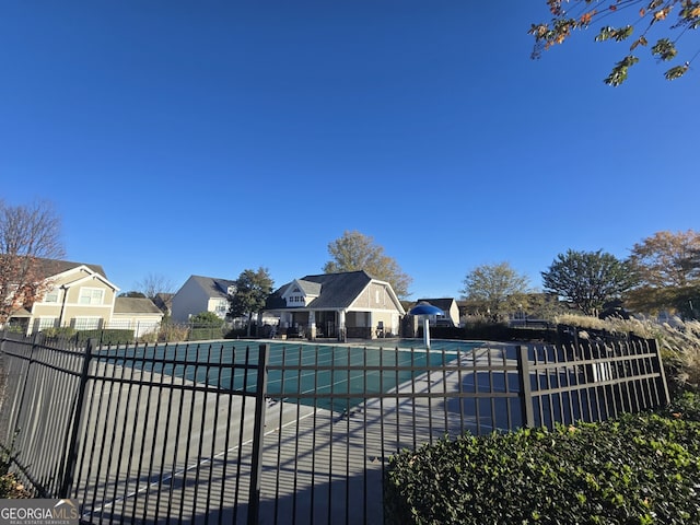 view of side of home with a yard