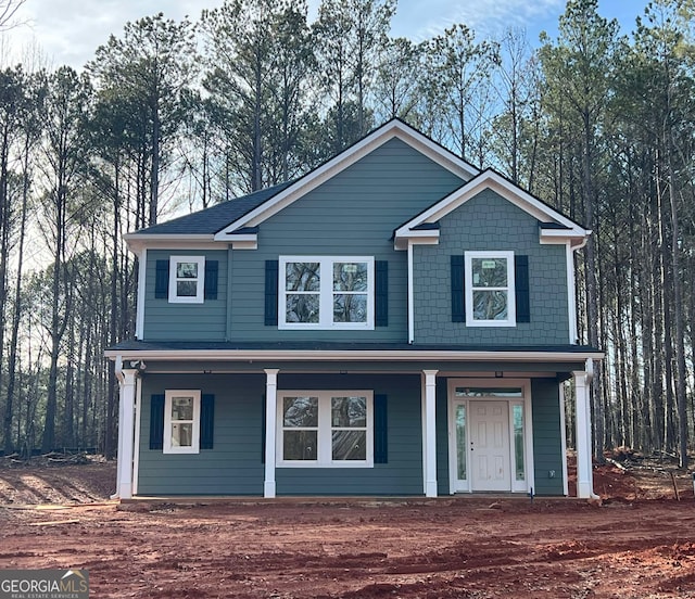 view of property featuring a porch