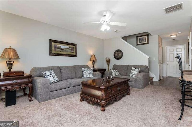 living room featuring ceiling fan