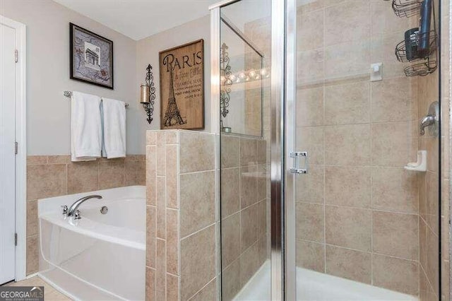 bathroom featuring plus walk in shower