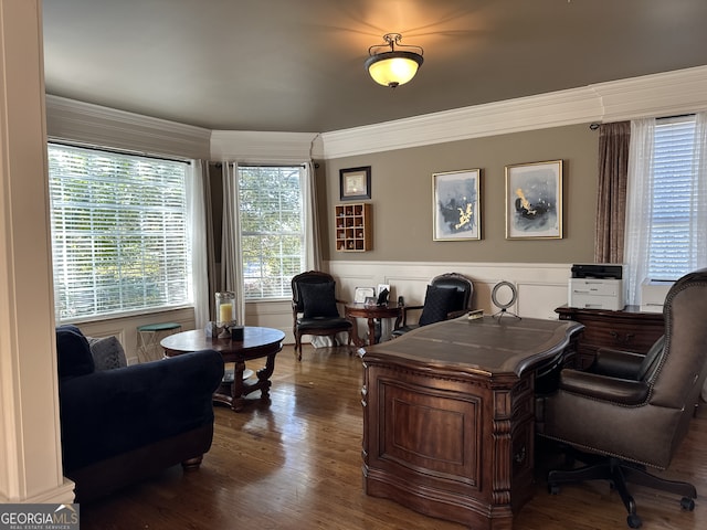 home office featuring dark wood-type flooring and ornamental molding