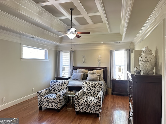 bedroom with coffered ceiling, dark hardwood / wood-style flooring, ornamental molding, and multiple windows