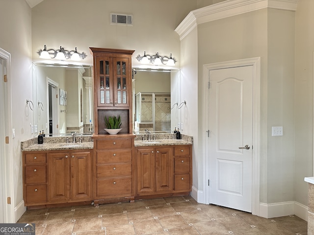 bathroom with vanity and walk in shower