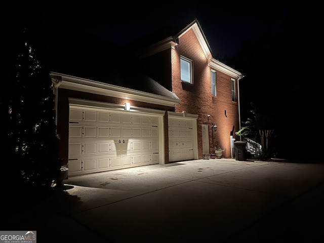 view of property exterior at night