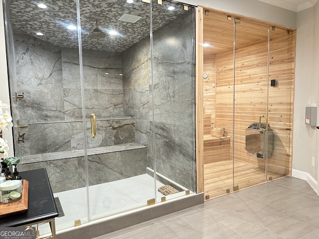 bathroom featuring a shower with shower door