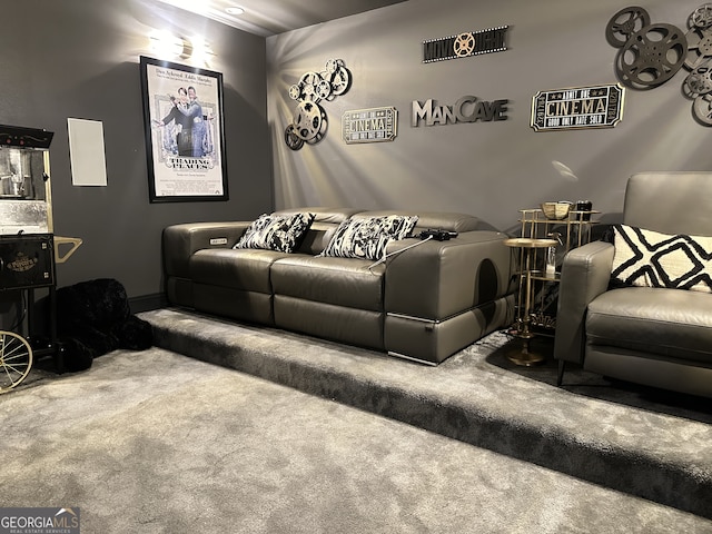 cinema room featuring carpet flooring