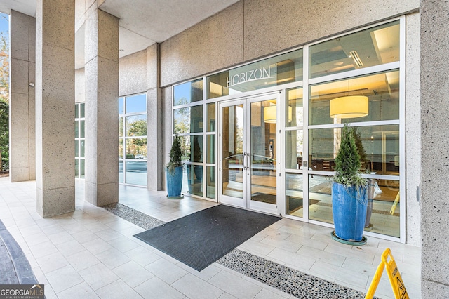 property entrance featuring french doors