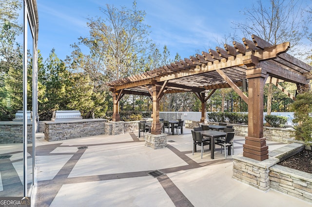 view of patio / terrace featuring a pergola and area for grilling