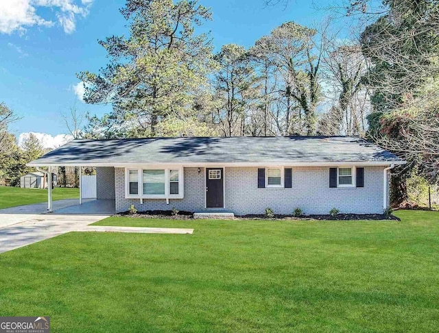 ranch-style house with a carport and a front lawn