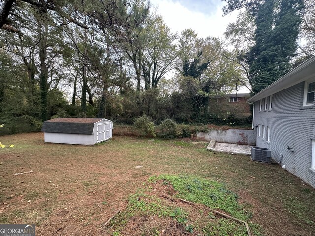 3691 Fred Walker Dr SW, Smyrna, GA 30082 - view of green lawn with cooling unit