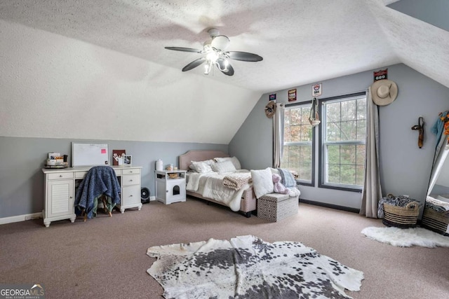 carpeted bedroom featuring a textured ceiling, ceiling fan, and lofted ceiling