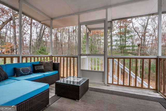 sunroom / solarium featuring plenty of natural light