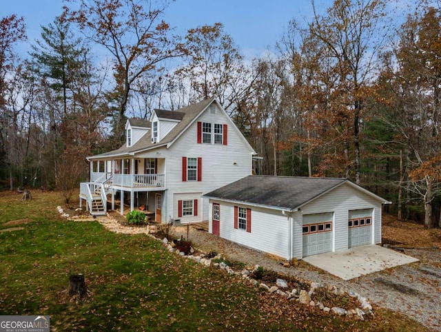 view of property exterior featuring a lawn and covered porch