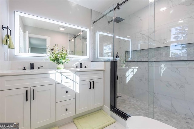 bathroom with vanity and walk in shower