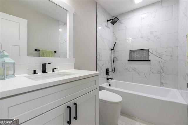 full bathroom with tiled shower / bath combo, toilet, and vanity