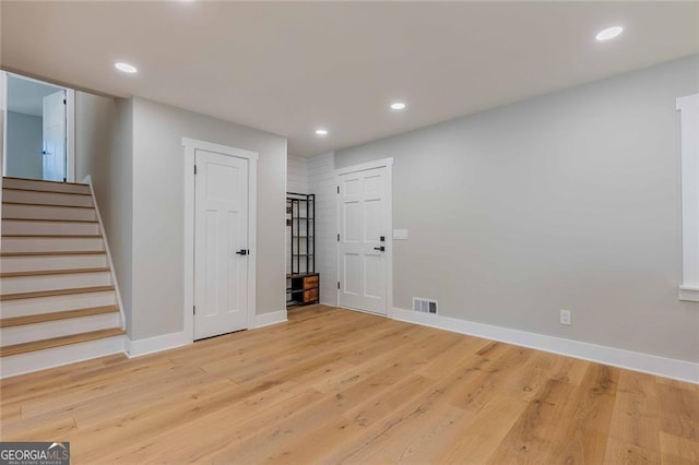 basement featuring light hardwood / wood-style floors