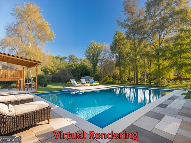 view of swimming pool featuring a patio area and a wooden deck