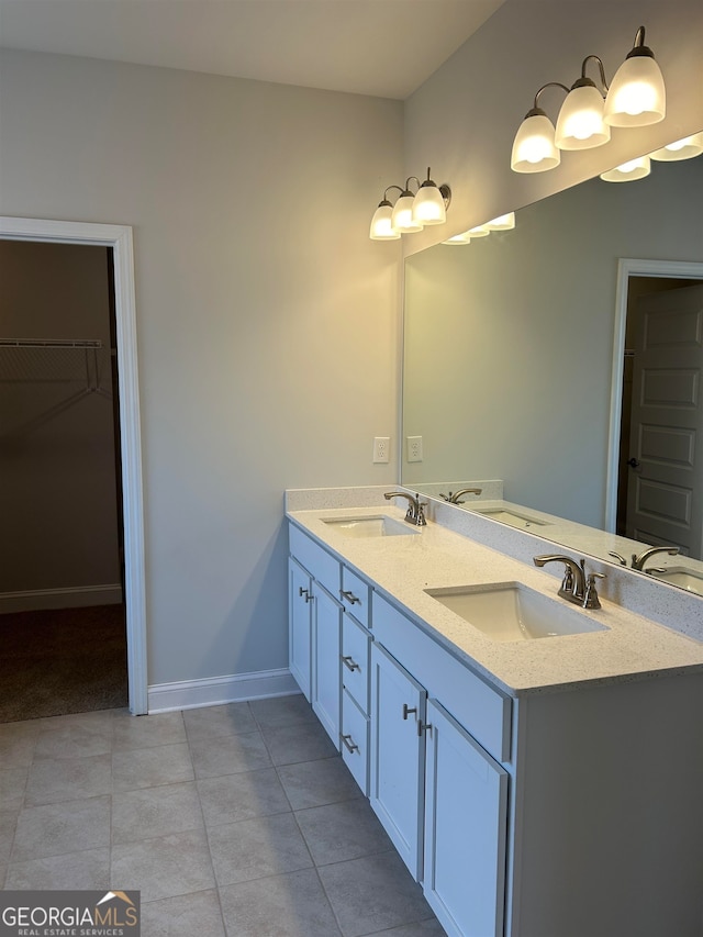 bathroom featuring tile patterned floors and vanity