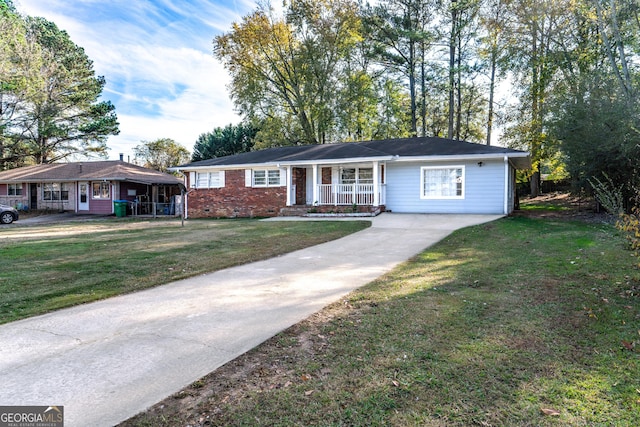 1396 Gale Dr, Norcross, GA 30093 - ranch-style home with a porch, driveway, a front lawn, and brick siding