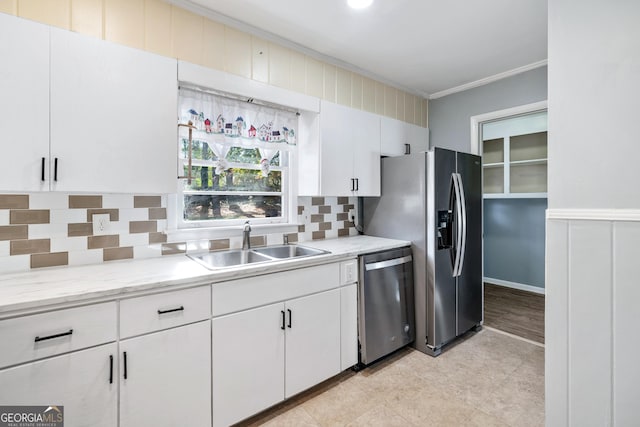 1396 Gale Dr, Norcross, GA 30093 - kitchen featuring dishwasher, crown molding, decorative backsplash, white cabinetry, and light tile patterned floors