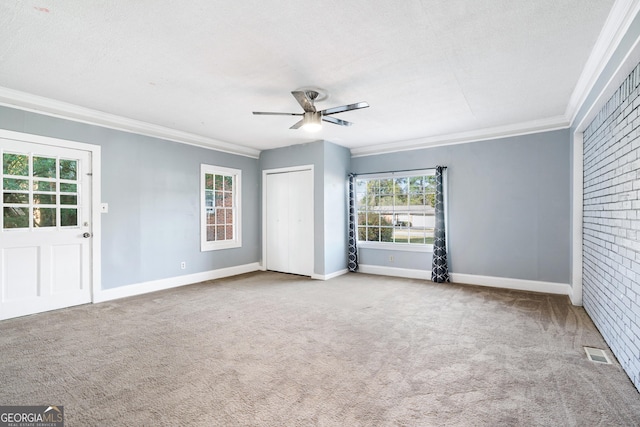 1396 Gale Dr, Norcross, GA 30093 - carpeted empty room with crown molding and a ceiling fan