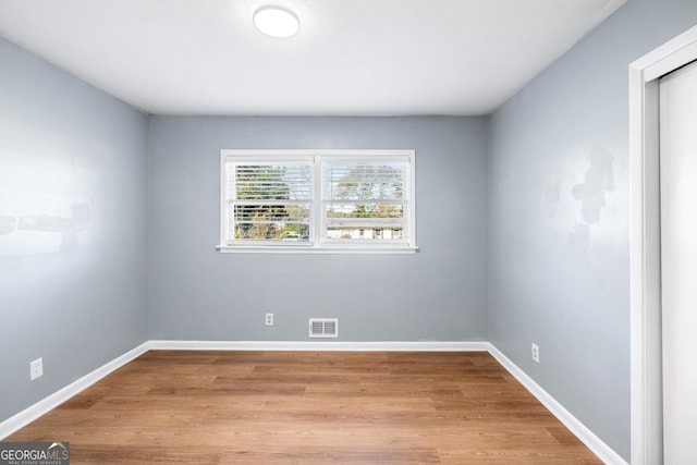 1396 Gale Dr, Norcross, GA 30093 - spare room featuring light wood finished floors and baseboards