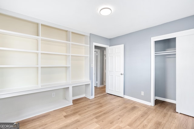 1396 Gale Dr, Norcross, GA 30093 - unfurnished bedroom featuring light wood finished floors and a closet
