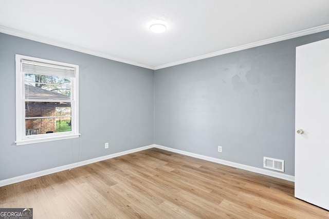 1396 Gale Dr, Norcross, GA 30093 - unfurnished room featuring ornamental molding and light wood-type flooring