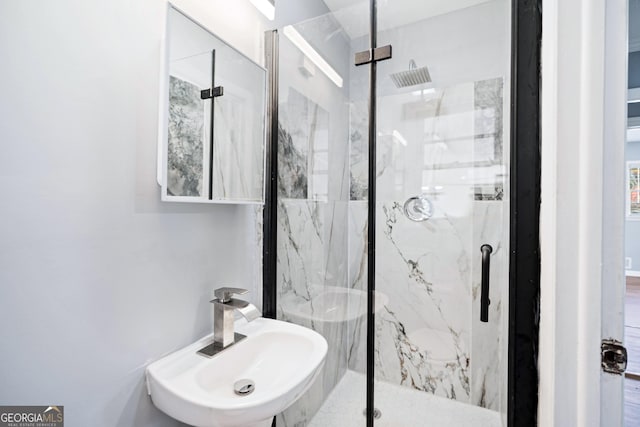 1396 Gale Dr, Norcross, GA 30093 - bathroom featuring a sink and a marble finish shower