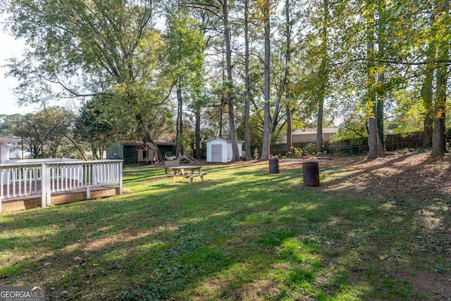1396 Gale Dr, Norcross, GA 30093 - view of yard featuring a storage shed and a wooden deck