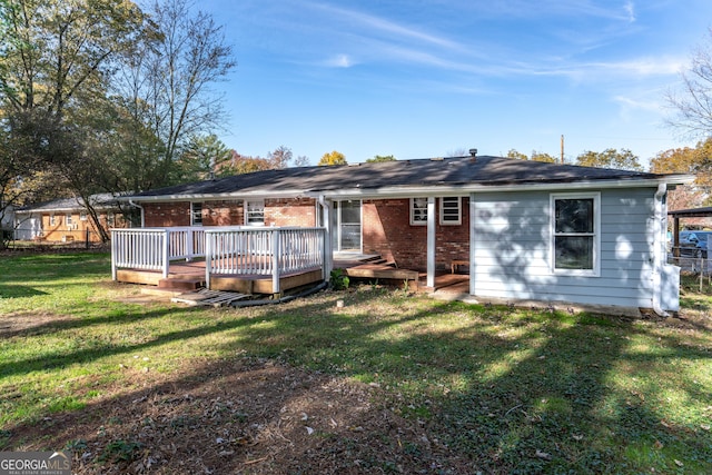 1396 Gale Dr, Norcross, GA 30093 - rear view of house with a wooden deck, a yard, and brick siding