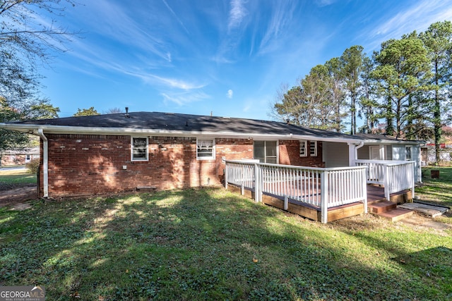 1396 Gale Dr, Norcross, GA 30093 - back of house featuring a yard, brick siding, and a wooden deck