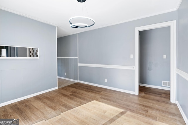 1396 Gale Dr, Norcross, GA 30093 - unfurnished room featuring wood finished floors and ornamental molding