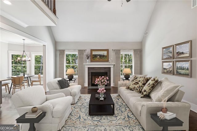 living room featuring wood-type flooring and a wealth of natural light