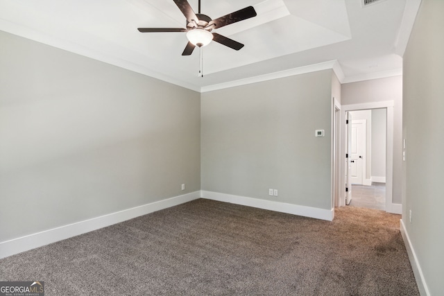 carpeted empty room featuring ceiling fan and ornamental molding